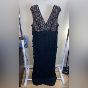 Cream lined with black lace ruffled, pleated cap sleeveless trumpet dress